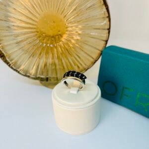 Anillo de plata y apliques